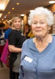 Elderly woman smiling at the camera
